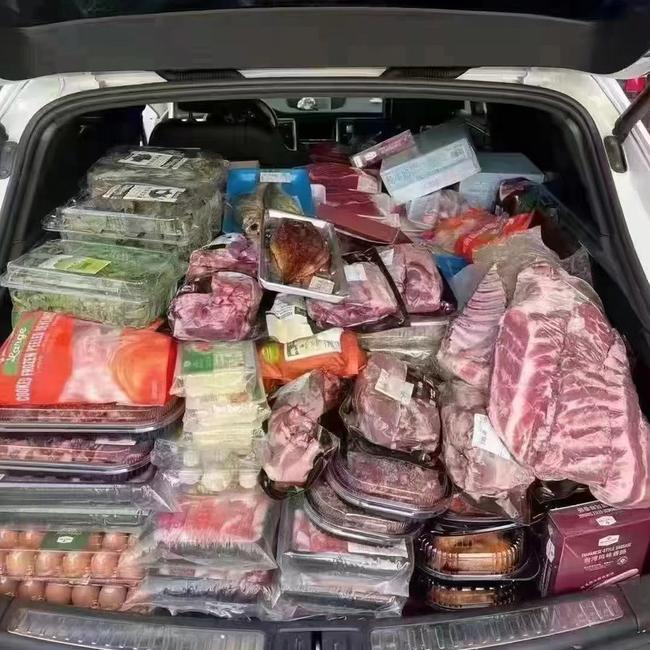 Car boot of a Chengdu resident. Citizens have swarmed stores to bulk buy items including vegetables and meat. Picture: Twitter