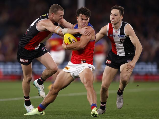 Cam Rayner breaks a tackle at Marvel Stadium. Picture: Darrian Traynor/Getty Images.