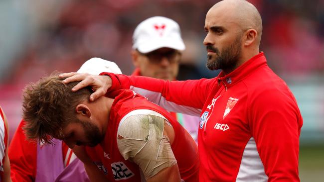 Rhyce Shaw comforts Alex Johnson.