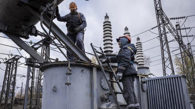 Workers repair infrastructure in a power plant that was damaged by a Russian air attack in Kyiv. Picture: Getty Images.