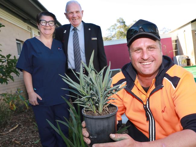 L-R Mt Druitt Hospital, Palliative Care Nursing Unit Manager Trish Dalgleish, Blacktown Workers Club Welfare Officer Harold Becker and Blacktown Workers Club Groundsmen Geoff Cooke in the Palliative care ward garden created for DoSomething Day 2018. Mount Druitt, Wednesday, July 25th 2018. Blacktown Workers Club members have been upgrading the entrance at Mt Druitt Hospital palliative care ward. (AAP Image / Angelo Velardo)