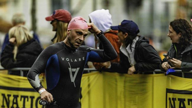 Athletes return from the swimming leg of the Ironman 70.3 Tasmania in Hobart on Sunday 4th February. Picture: Linda Higginson