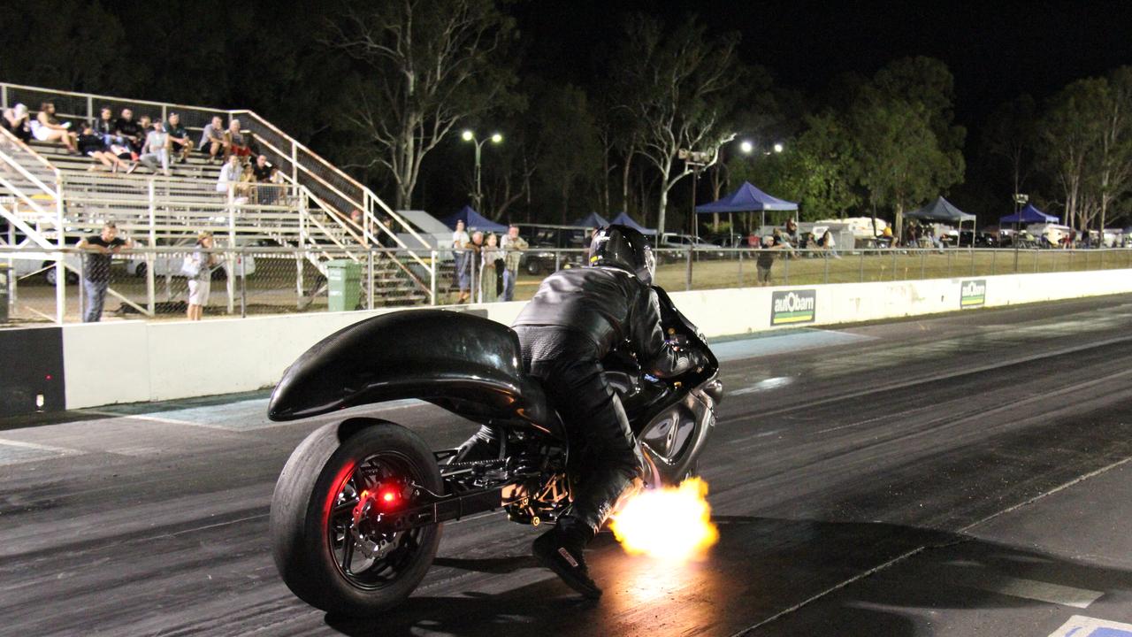Flames spit from the exhaust of Matt Walker's turbocharged Suzuki Hayabusa as he prepares to launch at Benaraby dragway. Picture: Rodney Stevens