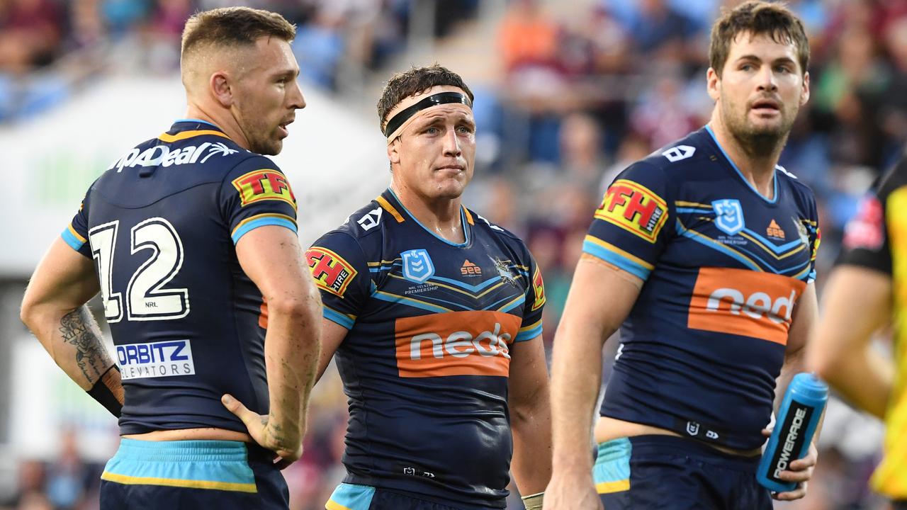 Bryce Cartwright, Jarrod Wallace and Anthony Don look on following a Manly try