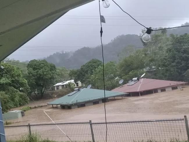 Homes at Wujal Wujal were inundated, with people scrambling to the roof to avoid the torrent. Picture: Supplied