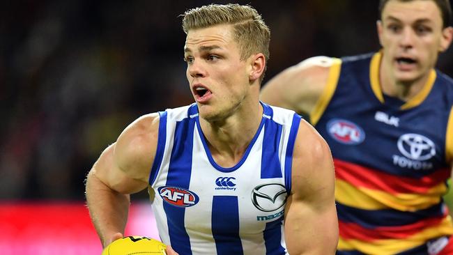 Mason Wood in action for North Melbourne.
