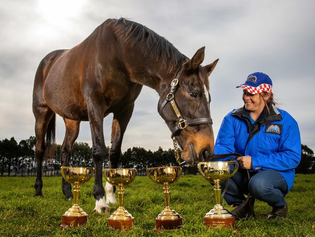 Three-time Melbourne Cup winner Makybe Diva pictured with her strapper Natalie Hinchcliffe. Picture: Mark Stewart