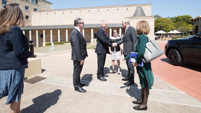 Prince Andrew greeted at Bond