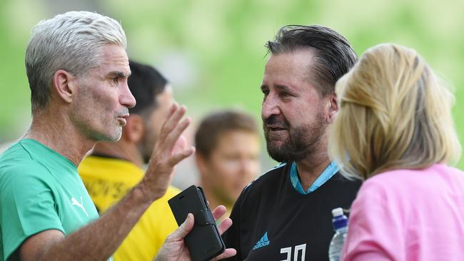 Socceroo Craig Foster and actor Anthony LaPaglia at half time. Picture: Josie Hayden