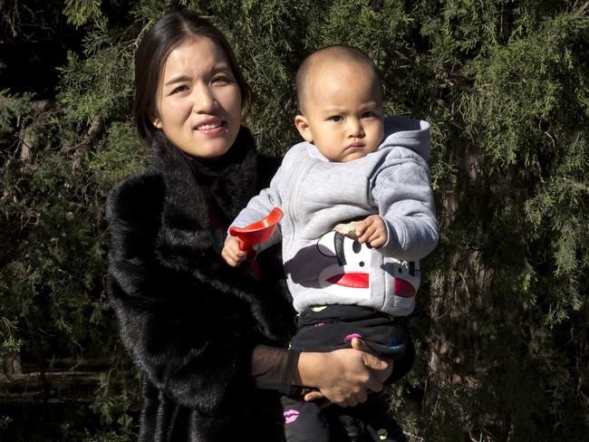 Chen Xiaoling with her son Xu Zhisheng ... she wasn’t eligible for more than one child, but had a second, anyway. She had to pay a 40,000-yuan ($6,325) fine. Picture: AP