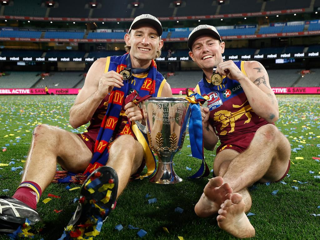 Lachie Neale and co-captain Harris Andrews soak up their success. Picture: Michael Willson/AFL Photos via Getty Images