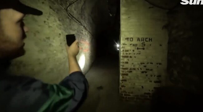 The group follows the signs to Arch 5.