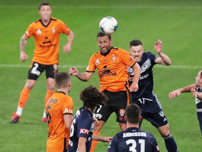 Scott McDonald heads home Brisbane’s first goal in the Roar’s 2-1 win over Melbourne Victory. Picture: Matt King/Getty Images