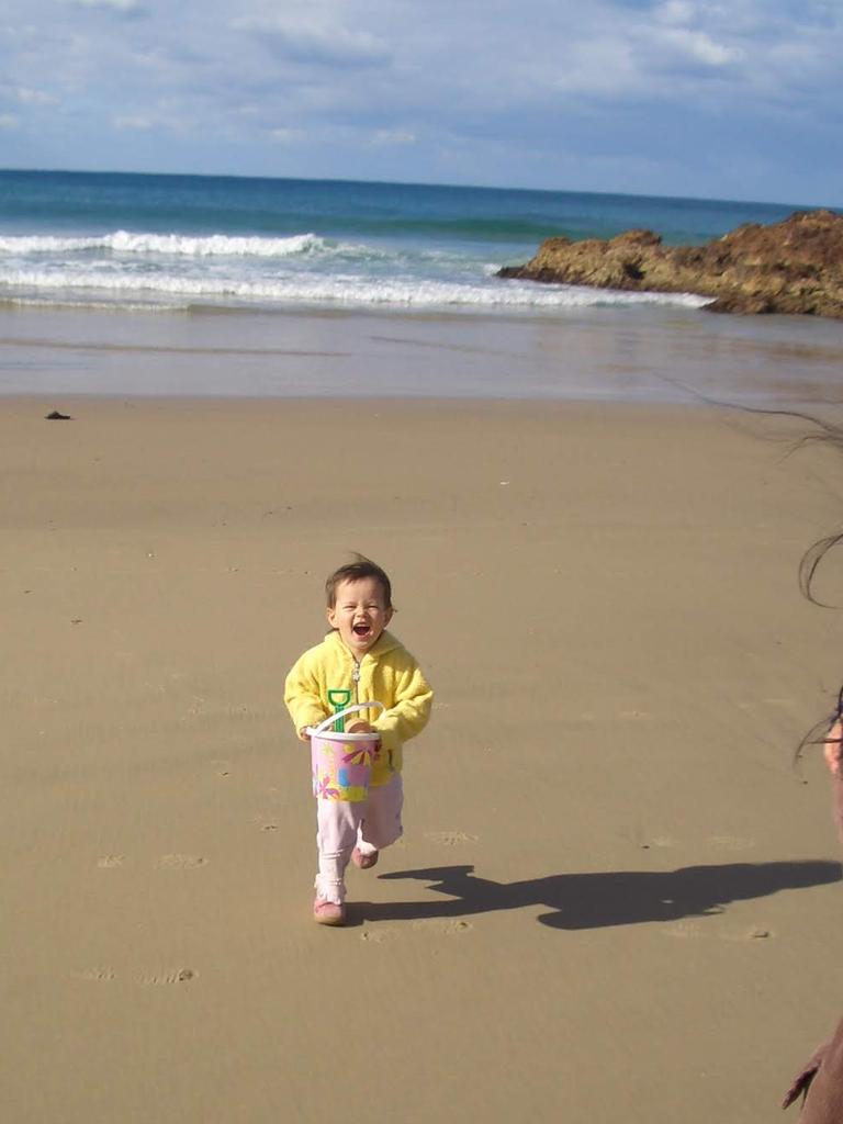 Isabelle, when she was at the beach as a little girl.