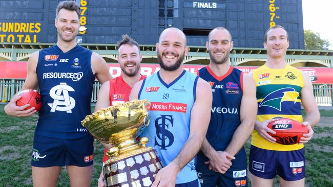 SANFL club captains - South Adelaide's Keegan Brooksby, North Adelaide's Max Thring, Sturt's Zane Kirkwood, Norwood's Jace Bode and Eagles’ Patrick Giuffreda — with the Thomas Seymour-Hill trophy at Adelaide Oval on Monday. Picture: AAP Image/ Brenton Edwards