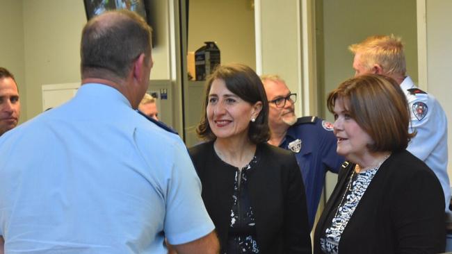 Gladys Berejiklian speaks with police at Ulladulla police station today. Picture: Twitter