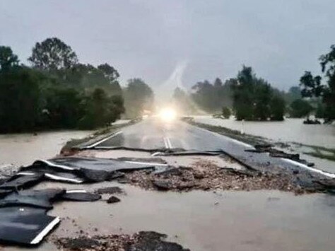 Queensland Bruce Highway cut by flooding. Source: Twitter/@GregBray1