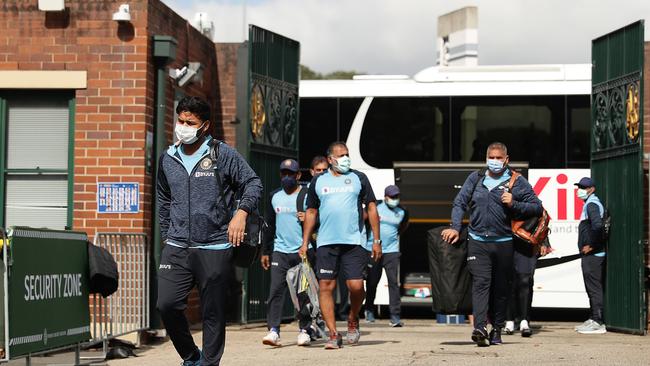 The Indian team and officials arrive for the India nets session at the Sydney Cricket Ground today. Photo: Mark Metcalfe/Getty Images