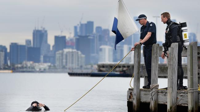 Acting Snr Sgt Scott Dower and Sgt Mark Braun practise drills at Williamstown. Picture: Andrew Henshaw