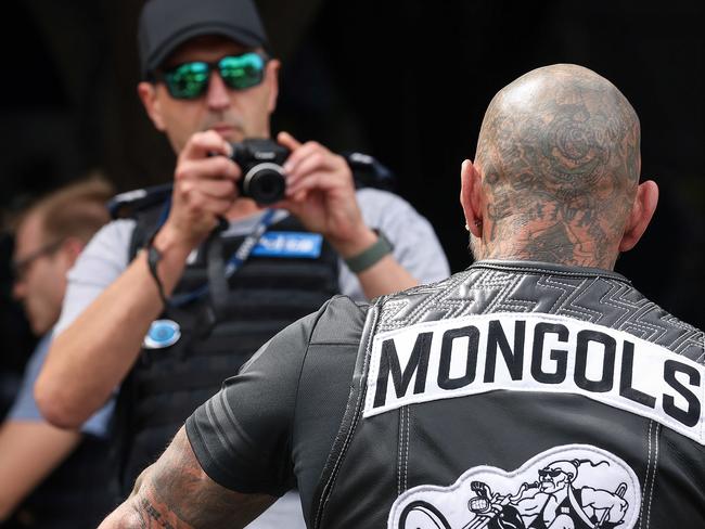 MELBOURNE, AUSTRALIA - NewsWire Photos 20 March , 2021: President of the Mongols bikie gang, Toby Mitchell has his picture taken by police as they carry out identity checks on members of the motorcycle gang after arriving in Port Melbourne from Bendigo.Picture : NCA NewsWire / Ian Currie