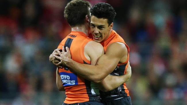 Dylan Shiel and Toby Greene celebrate the win. Picture: Toby Zerna