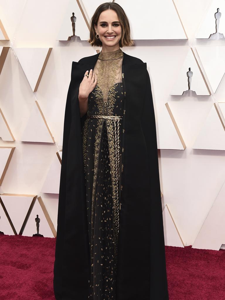 Natalie Portman can’t wipe the grin off her face on the red carpet. Picture: AP