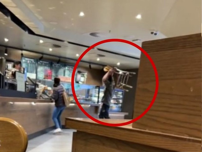 Man attacks Starbucks counter with chair. Picture: TikTok / caradnopal