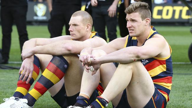 Josh Jenkins, right, with Sam Jacobs after the 2017 grand final loss. Picture Sarah Reed