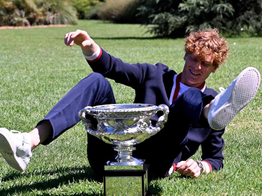 Jannik Sinner makes himself comfortable at the Royal Botanic Gardens following his victory against Russia's Daniil Medvedev. Picture: AFP/Getty Images