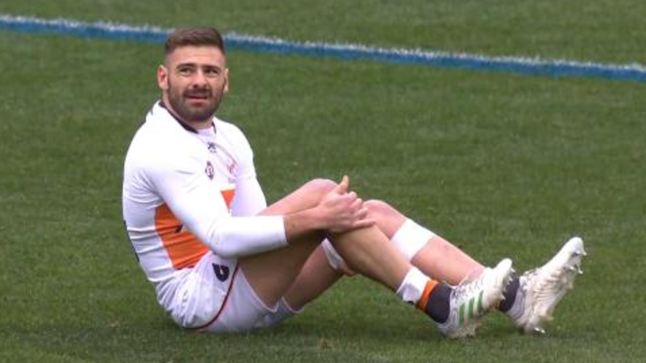 Stephen Coniglio goes down with a knee injury.
