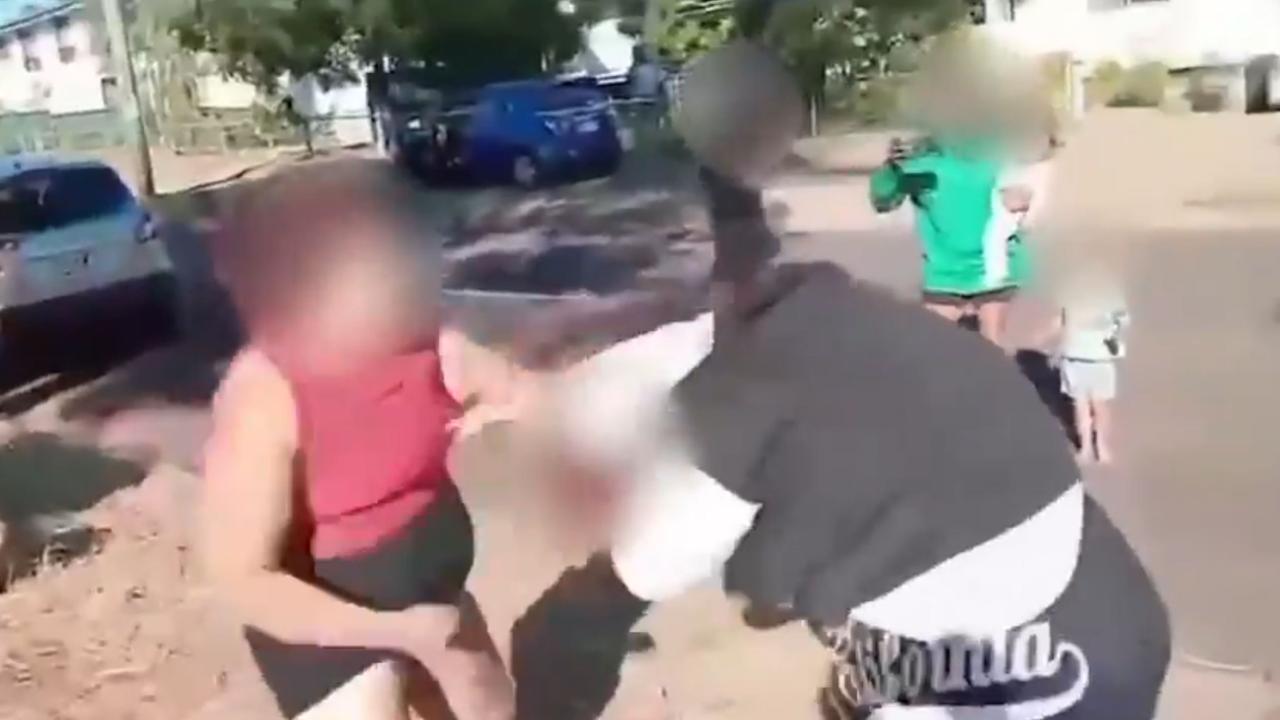 A mother steps in to break up a wild fight between two women throwing punches and pulling hair in outback Queensland. Picture: Supplied
