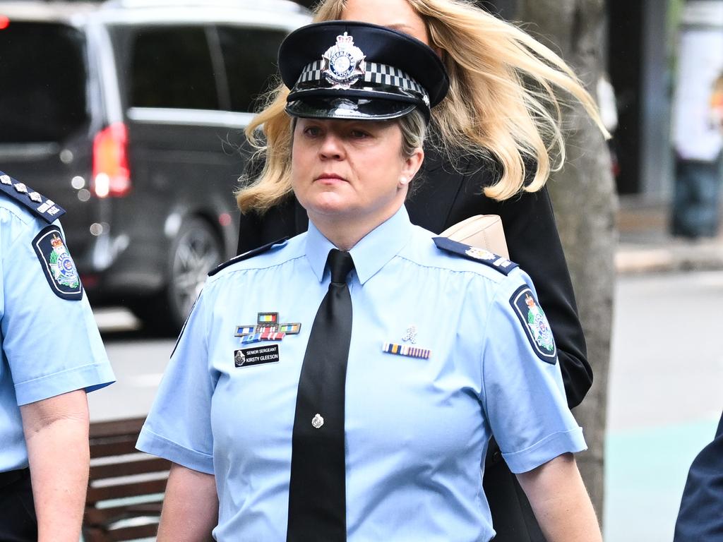 Senior Sergeant Kirsty Gleeson (centre) arrives at the Brisbane Coroners Court to give evidence at the inquest. Picture: Dan Peled