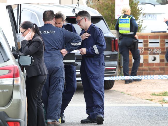 Forensic police on the scene. Picture: David Crosling