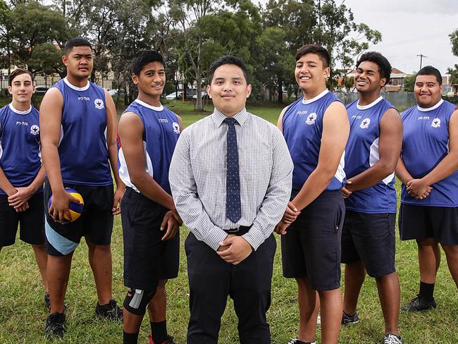 Coach Francis Floresca with some of his champion players, Khaled Osmani, James Makoni, Duwayne Swann, Alex Tekii, Elijah Rokolaqa and Israel McCormick. Picture: Carmela Roche