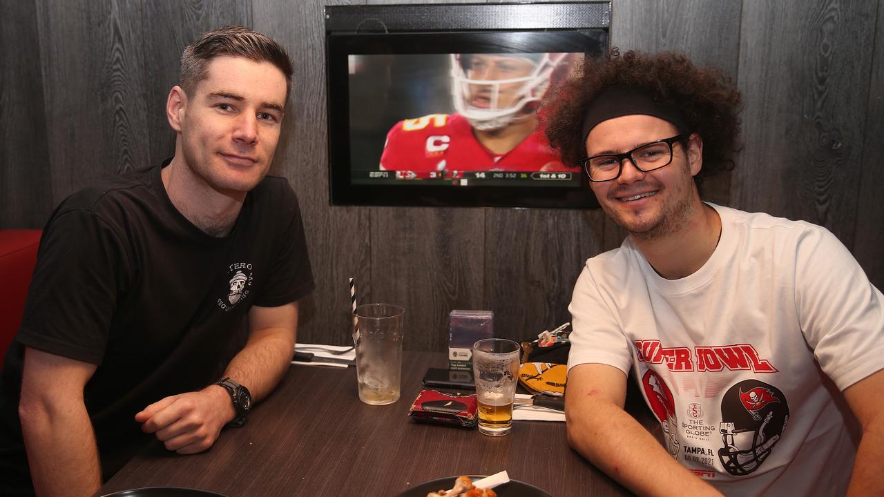 Superbowl fans Zach Dunkley and Thomas Rogers at the Sporting Globe. Picture: Alison Wynd