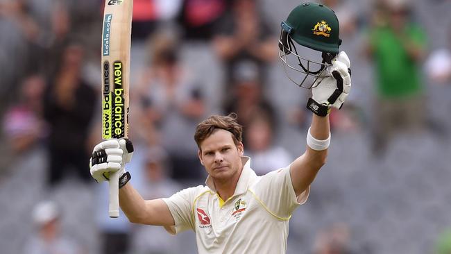 Steve Smith celebrates a century against England in Melbourne.