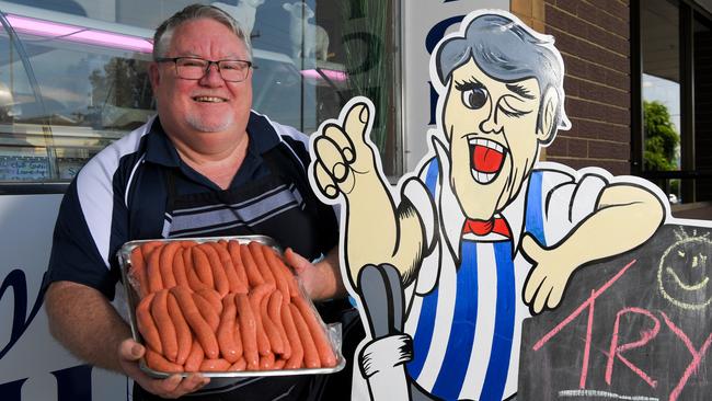 John Hamilton with the shop’s popular snags, which are all gluten free.