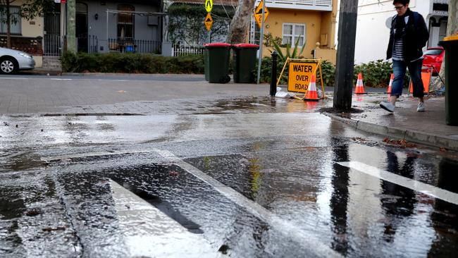 A water leak on Bourke St and Boronia Ln in Redfern has been on going for weeks. Picture: John Grainger