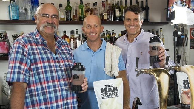 Adam MacDougall with Paul Roos and Merv Hughes and The Man Shake.