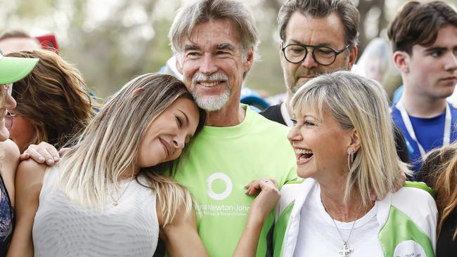 Chloe Lattanzi, John Easterling and Olivia Newton-John at the ONJ Wellness Walk and Research Run in 2019 in Melbourne. Picture: WireImage