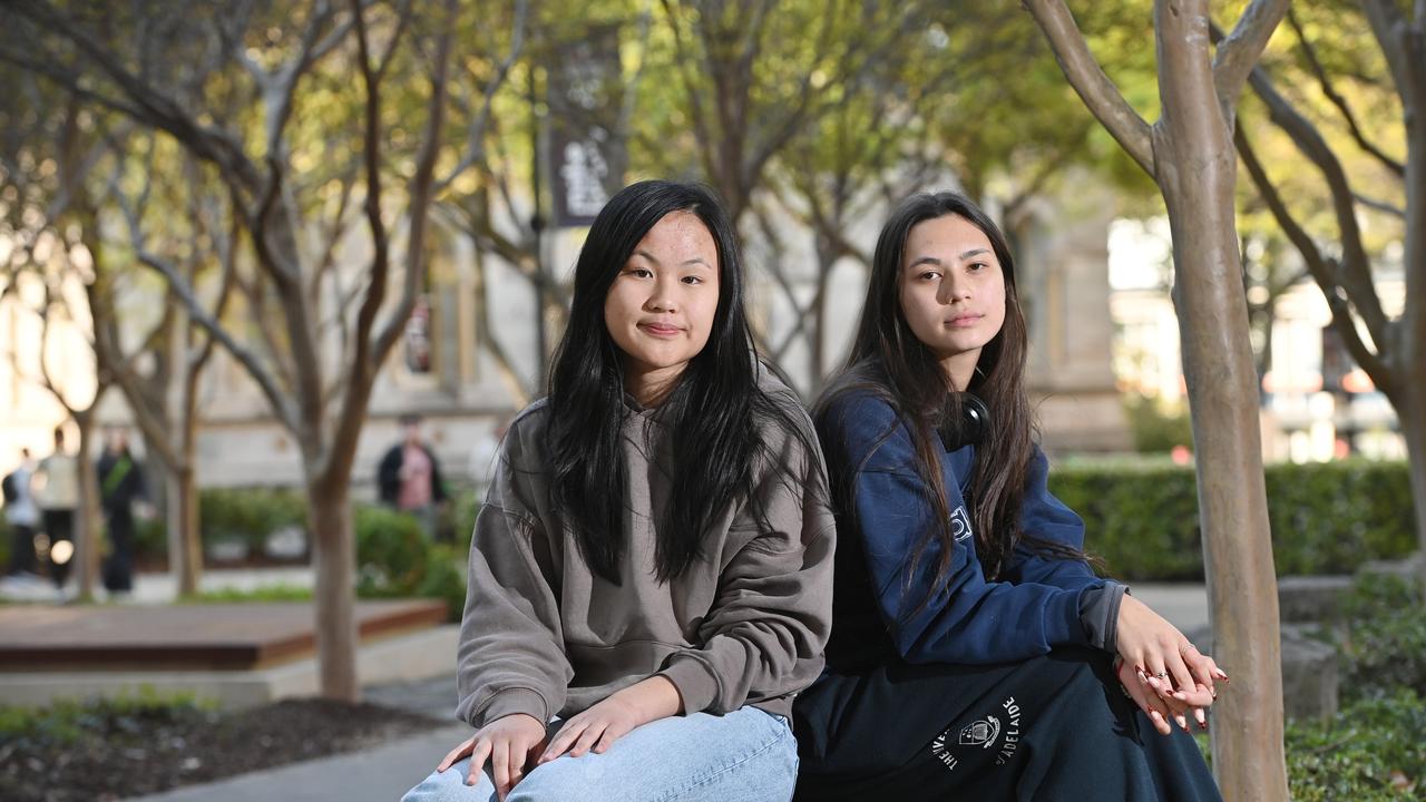 University of Adelaide students Erin Nguyen (left) and Marley Wiltshire (right). Students at Adelaide’s new super-university will no longer be expected to attend face-to-face lectures, instead being offered “asynchronous digital activities” in an online-first shift. Picture: Keryn Stevens