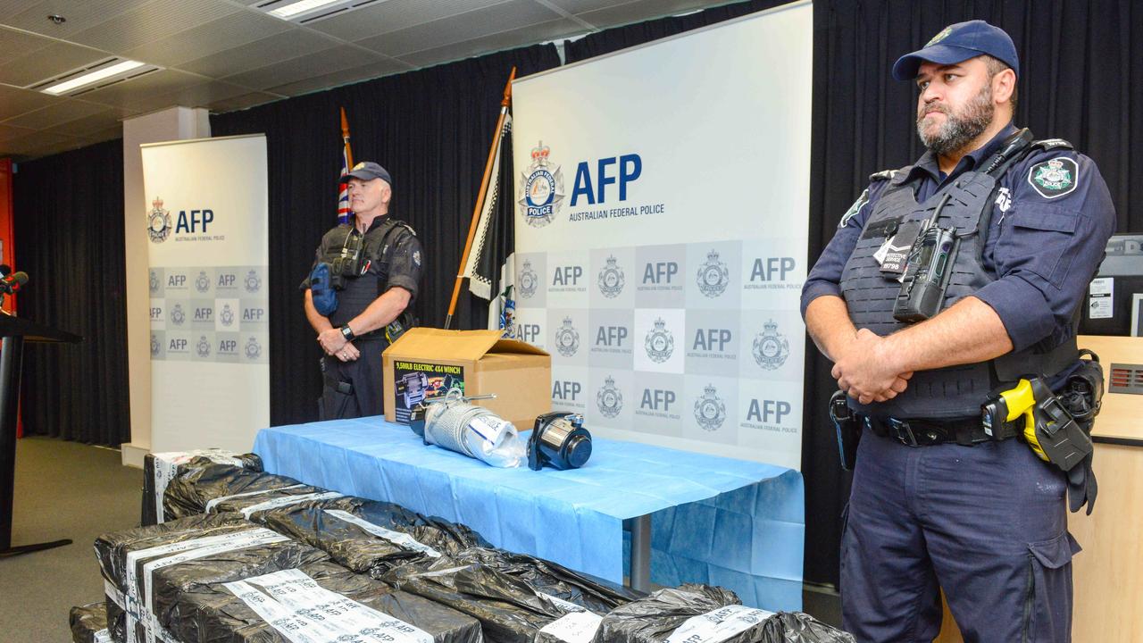 AFP officers stand guard a bust of ice with an estimated street value of $13.5 million in 2019. Picture: AAP Image/Brenton Edwards