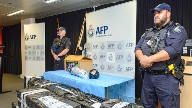 AFP officers stand guard a bust of ice with an estimated street value of $13.5 million in 2019. Picture: AAP Image/Brenton Edwards