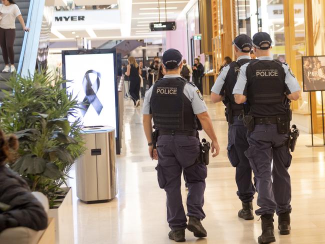 SYDNEY, AUSTRALIA.NewsWire Photos. April 20, 2024.Tributes flow as shoppers return to Westfield shopping centre in Bondi Junction a week after 40 year old Joel Cauchi stabbed and killed six people and wounded many others before being shot dead by police .  Picture: NCA NewsWire / Jeremy Piper