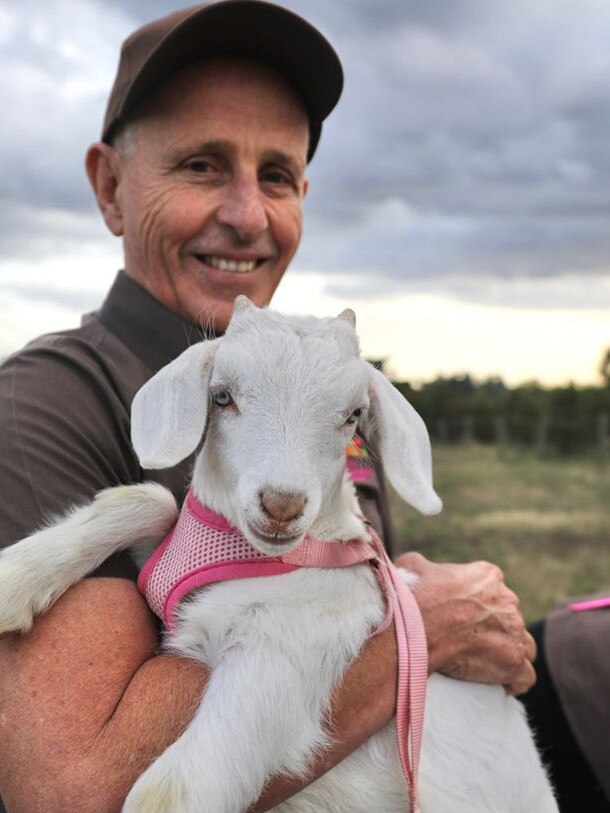 Ian Neeland with baby Coconut.