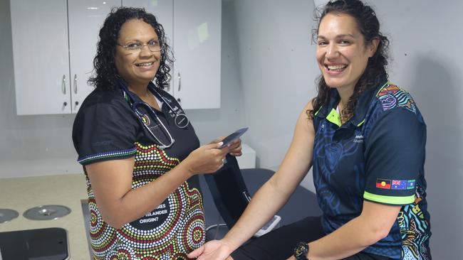 Sherry Holzapfel and Natasha White in the Better Together Health van.