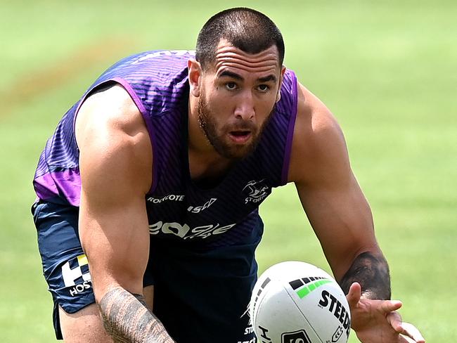 SUNSHINE COAST, AUSTRALIA - SEPTEMBER 29: Nelson Asofa-Solomona passes the ball during a Melbourne Storm NRL training session at Sunshine Coast Stadium on September 29, 2020 in Sunshine Coast, Australia. (Photo by Bradley Kanaris/Getty Images)