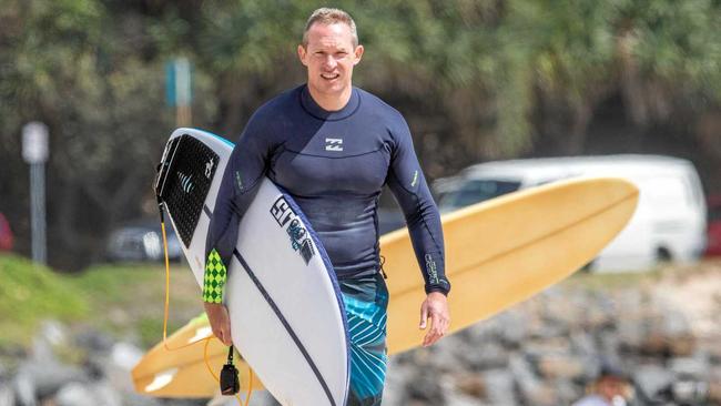 FROTHING: Mick De Brenni having an early surf at Dbah. Picture: Surfing Qld