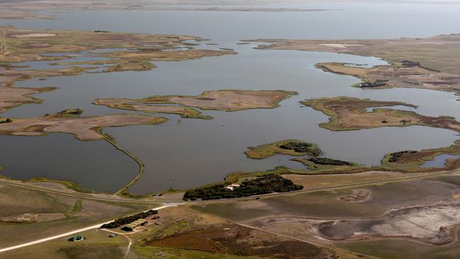 Aust politician Federal Water Minister Tony Burke on a helicopter flyover tour of the Coorong and the Lower Lakes, SA. Lake Albert and lower lakes near Meningie.