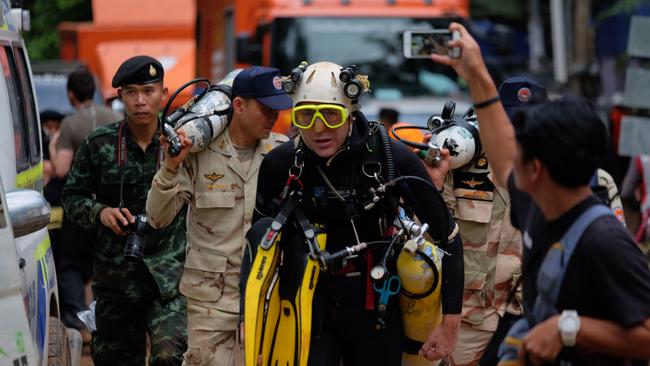 British cave diver John Volanthen walks out of Tham Luang cave in full kit after establishing a guide line for other rescuers to follow on June 23.